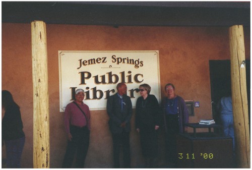 Standing in front of the new sign are Ben Wakashige, State Librarian; Ed Norris, architect; Toni Beatty, Library Director, Rio Rancho Public Library; and Judith Isaacs, Library Director.