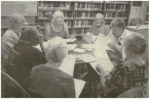 FRIENDS OF THE LIBRARY - The Friends of the Jemez Springs Library met on Aug. 26. The non-profit group raises funds to support the library’s programs. Clockwise from top left are Mardi Holder, Sara Winter, Morris Taylor, Larry Rodgers, Judith Isaacs, Willa Doppmann and Kathleen Wiegner. Photo by Robert Borden/Jemez Thunder