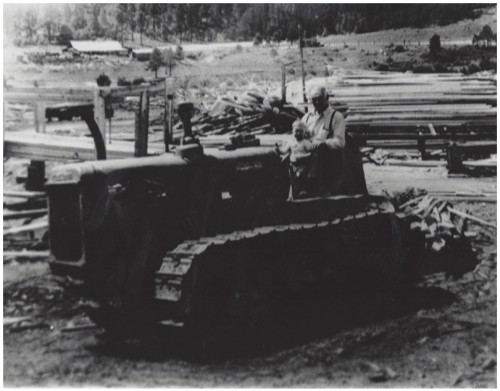 Lew Caldwell, Sr., Howard Caldwell with Dan Maestas’s Barn – Irene Martinez’s Store in the Background
