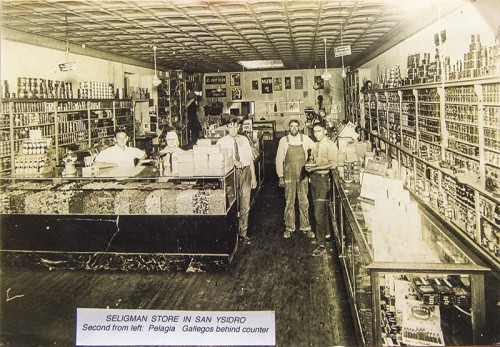 Seligman Store in San Ysidro. Second from left: Pelagia Gallegos behind counter. Used with permission from files of Sandoval County Historical Society.
